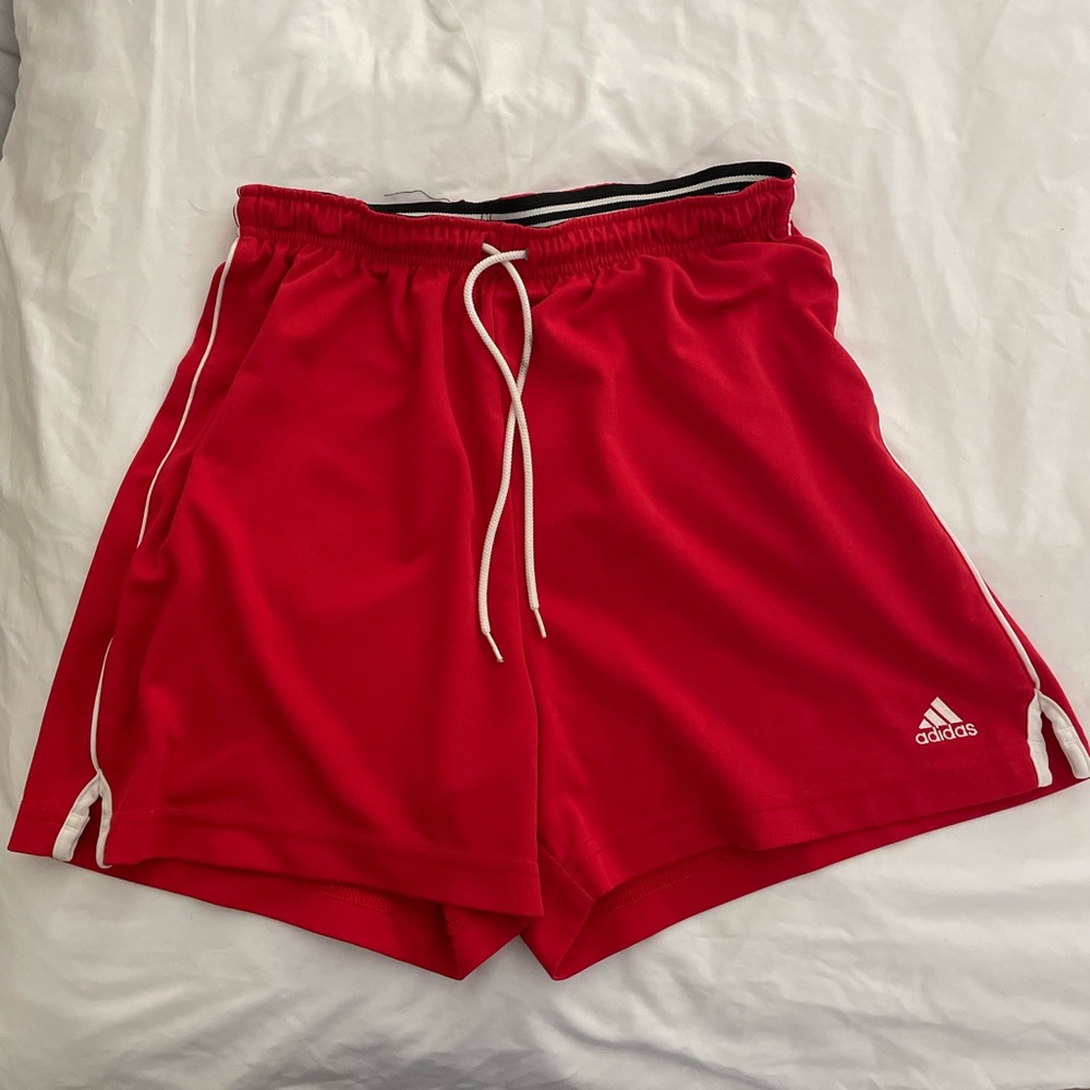 Red Adidas running shorts